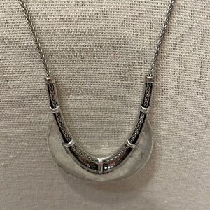 Lucky adjustable to any length silver necklace and pendant.